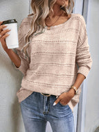 Crew-neck pullover sweater with drop shoulders and loose, relaxed fit for casual all-season wear