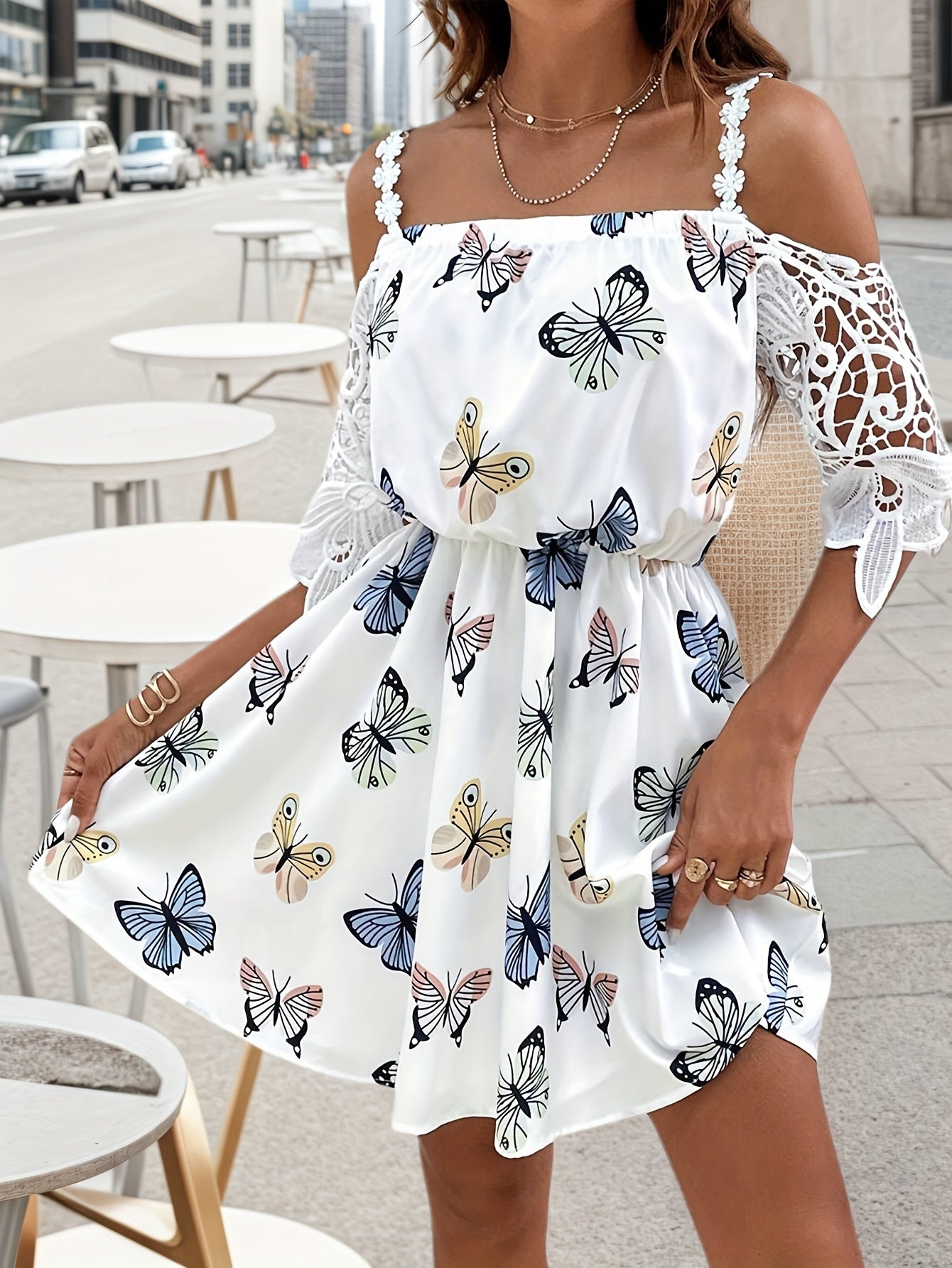 Off-shoulder butterfly print dress with lace sleeves, perfect for summer outings