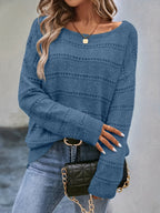 Crew-neck pullover sweater with drop shoulders and loose, relaxed fit for casual all-season wear