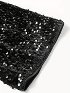 Black sequin crew-neck dress with long sleeves and back bowknot — ideal for parties and holiday events