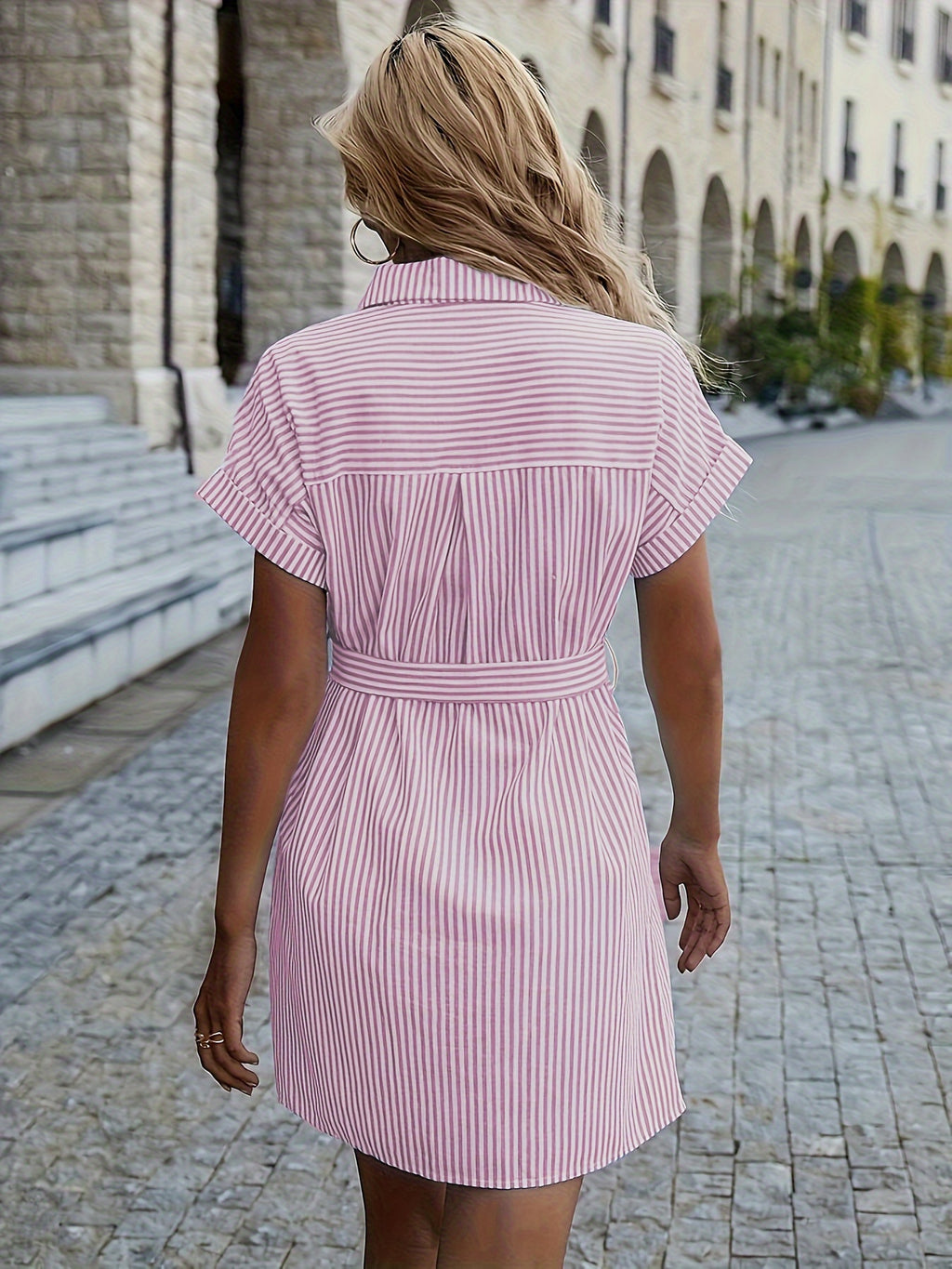 Striped shift dress with ruffle detail, perfect for casual all-season wear.