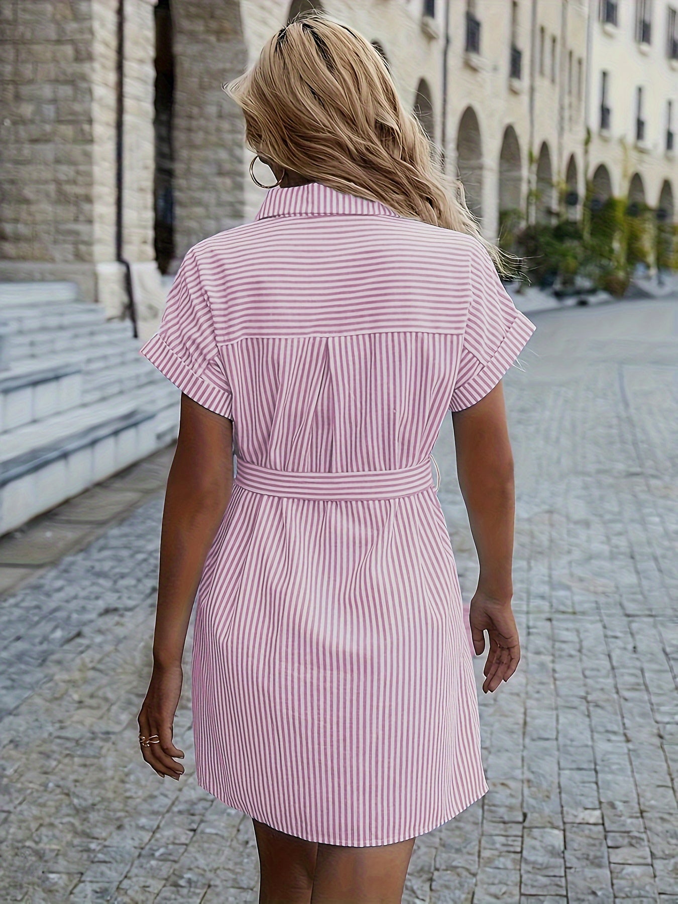 Striped shift dress with ruffle detail, perfect for casual all-season wear.