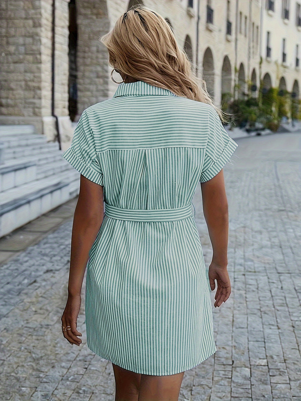 Striped shift dress with ruffle detail, perfect for casual all-season wear.