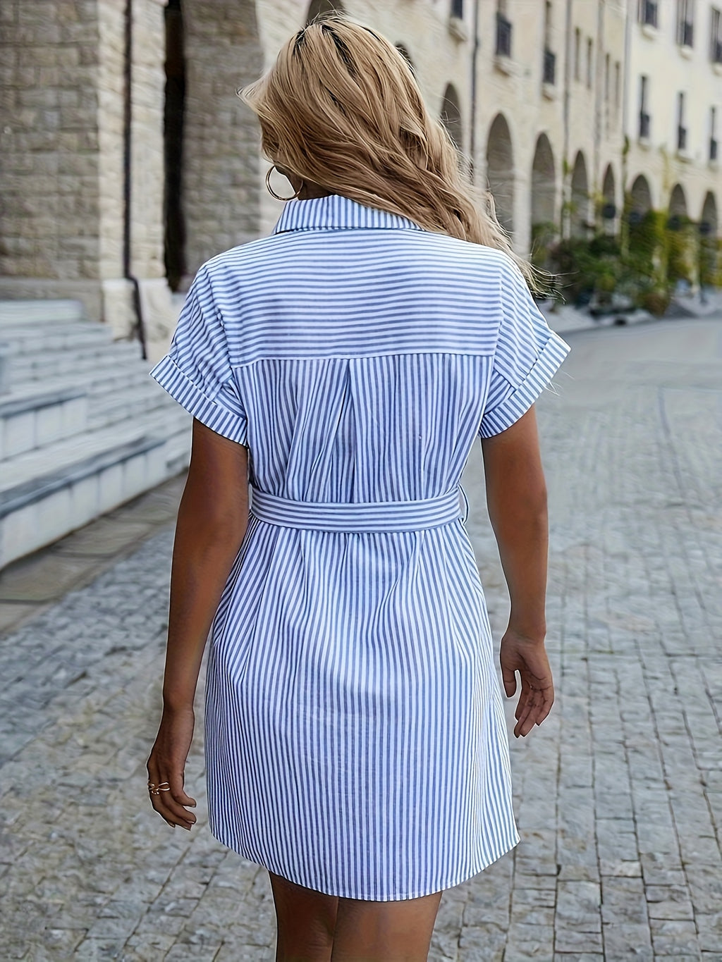 Striped shift dress with ruffle detail, perfect for casual all-season wear.