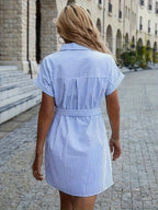 Striped shift dress with ruffle detail, perfect for casual all-season wear.