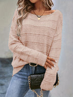 Crew-neck pullover sweater with drop shoulders and loose, relaxed fit for casual all-season wear